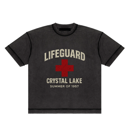 Screaming Saints black 'Lifeguard Crystal Lake' unisex t-shirt with a vintage-style logo and 'Summer of 1957' text.
